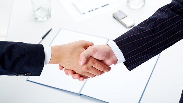 Business people shaking hands